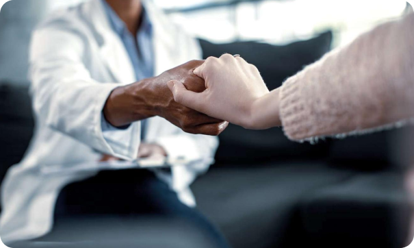 Doctor and patient shaking hands